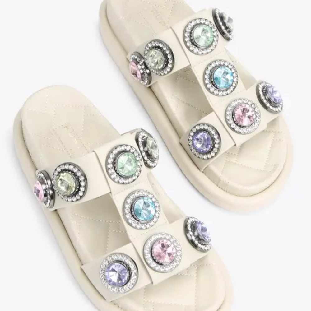 Kurt Geiger London Embellished Cream Slide Sandals with Pastel Gem Accents.
